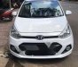 Hyundai Grand i10 2015 - Cần bán gấp Hyundai Grand i10 2015, màu trắng, xe nhập giá cạnh tranh