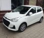 Hyundai Grand i10  1.2 MT BASE 2018 - Cần bán xe Hyundai Grand i10 1.2 MT BASE năm sản xuất 2018, màu trắng