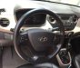 Hyundai Grand i10   1.0AT 2015 - Cần bán gấp Hyundai Grand i10 1.0AT 2015, màu bạc, giá tốt