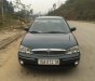 Ford Laser Ghia 2002 - Cần bán xe Ford Laser Ghia 1.8MT. Màu xanh lục, giá chỉ 185 triệu