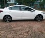 Kia Cerato 1.6 2018 - Bán xe Kia Cerato 1.6 AT màu trắng sản xuất 2018 đăng ký 04/2018