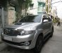 Toyota Fortuner G 2015 - Mình cần bán Fortuner G 2015 dầu màu bạc, xe đi giữ kỹ còn rất đẹp