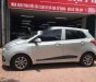 Hyundai Grand i10   1.0AT 2015 - Cần bán gấp Hyundai Grand i10 1.0AT 2015, màu bạc, giá tốt