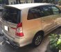 Toyota Innova E 2015 - Cần bán lại xe Toyota Innova E đời 2015, màu vàng