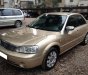 Ford Laser      1.8 MT 2005 - Gia đình cần bán Ford Laser 1.8 Sx 2005, số sàn, màu vàng cát còn mới