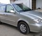 Kia Carnival AT  2009 - Cần bán Kia Carnival AT đăng ký 2009, màu bạc, xe nhập, giá tốt 255 triệu