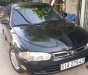 Mitsubishi Proton 1997 - Cần bán lại xe Mitsubishi Proton đời 1997, màu đen