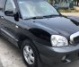 Hyundai Santa Fe   2.0 AT  2005 - Bán Hyundai Santa Fe 2.0 AT 2005, màu đen chính chủ, giá tốt