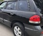 Hyundai Santa Fe   2.0 AT  2005 - Bán Hyundai Santa Fe 2.0 AT 2005, màu đen chính chủ, giá tốt