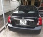 Daewoo Lacetti    2010 - Cần bán Daewoo Lacetti đời 2010, màu đen