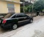 Chevrolet Lacetti 2004 - Cần bán gấp Chevrolet Lacetti sản xuất 2004, màu đen, giá tốt