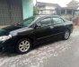 Toyota Corolla altis 2009 - Cần bán xe Toyota Corolla Altis đời 2009, màu đen, giá tốt