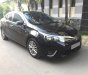 Toyota Corolla altis  G 2014 - Bán Toyota Corolla Altis G đời 2015 số sàn, màu đen