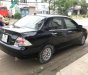 Mitsubishi Lancer   2004 - Bán lại xe Mitsubishi Lancer đời 2004, màu đen