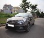 Kia Rio 1.4 GAT 2016 - Bán Kia Rio Hatchback 2016 tự động, màu nâu, xe zin nguyên bản đẹp