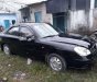 Daewoo Nubira 2002 - Bán Daewoo Nubira đời 2002, màu đen còn mới, giá 95tr