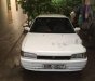 Mazda 323 1997 - Cần bán gấp Mazda 323 đời 1997, màu trắng
