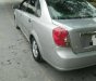 Chevrolet Lacetti  SE 2005 - Chính chủ bán Chevrolet Lacetti SE đời 2005, màu bạc