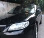 Mazda 323 2004 - Gia đình bán Mazda 323 2004, màu đen, 150tr
