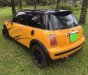 Mini Cooper   2004 - Cần bán lại xe Mini Cooper đời 2004, màu vàng