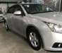 Chevrolet Cruze    2010 - Cần bán gấp Chevrolet Cruze sản xuất 2010, màu bạc 