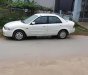 Ford Laser   2002 - Bán xe Ford Laser đời 2002, màu trắng, 144 triệu