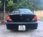 Kia Spectra   2004 - Cần bán xe Kia Spectra năm 2004, màu đen xe gia đình