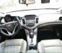 Chevrolet Cruze 1.8LTZ 2014 - Cần bán lại xe Chevrolet Cruze 1.8LTZ sản xuất năm 2014, màu trắng