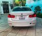 BMW 3 Series 320i 2012 - Bán xe BMW 320i màu trắng camay 2013 - 839 triệu