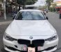 BMW 3 Series 320i 2012 - Bán BMW 320i sản xuất 2012, màu trắng, xe nhập