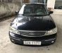 Ford Laser 2003 - Cần bán lại xe Ford Laser đời 2003, màu đen, 200tr