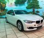 BMW 3 Series 320i 2012 - Bán xe BMW 320i màu trắng camay 2013 - 839 triệu
