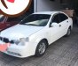 Daewoo Lacetti 2004 - Cần bán lại xe Daewoo Lacetti năm 2004, màu trắng