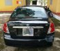 Chevrolet Lacetti  EX   2004 - Cần bán xe Chevrolet Lacetti EX năm sản xuất 2004, màu đen