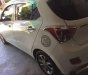 Hyundai Grand i10   MT 2014 - Gia đình bán Hyundai Grand phiên bản cao cấp, Sx 2014, lăn bánh 4-2015