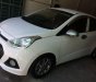 Hyundai Grand i10   MT 2014 - Gia đình bán Hyundai Grand phiên bản cao cấp, Sx 2014, lăn bánh 4-2015