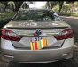 Toyota Camry 2.0 E  2013 - Cần bán xe Toyota Camry 2.0 E đời 2013, màu nâu, giá tốt