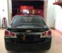 Chevrolet Cruze   2010 - Bán xe Chevrolet Cruze đời 2010, màu đen số sàn