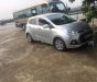 Hyundai Grand i10  1.0 MT 2014 - Cần bán lại xe Hyundai Grand i10 1.0 MT sản xuất 2014, màu bạc 