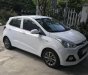 Hyundai Grand i10 2014 - Cần bán Hyundai Grand i10 năm 2014, màu trắng giá cạnh tranh