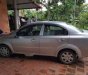 Daewoo Gentra MT 2006 - Cần bán Daewoo Gentra MT 2006, màu bạc, xe gia đình vẫn đang sử dụng bình thường