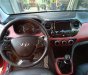 Hyundai Grand i10 2015 - Cần bán gấp Hyundai Grand i10 năm sản xuất 2015, màu đỏ, nhập khẩu số sàn