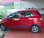 Hyundai Grand i10 2015 - Cần bán gấp Hyundai Grand i10 năm sản xuất 2015, màu đỏ, nhập khẩu số sàn