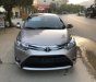 Toyota Vios  E 1.5MT  2014 - Bán Toyota Vios E số sàn năm sản xuất 2014, màu vàng