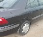 Mazda 626 2001 - Cần bán lại xe Mazda 626 năm sản xuất 2001, màu đen