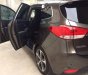 Kia Rondo   2.0GAT 2015 - Chính chủ bán Kia Rondo 2.0GAT sản xuất 2015, màu nâu