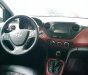 Hyundai Grand i10 1.2 AT 2018 - Cần bán lại xe Hyundai Grand i10 1.2 AT sản xuất 2018, màu trắng như mới