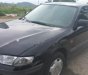 Mazda 626 2001 - Cần bán lại xe Mazda 626 năm sản xuất 2001, màu đen