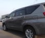 Toyota Innova 2016 - Cần bán lại xe Toyota Innova đời 2017, màu xám còn mới
