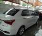 Hyundai Grand i10 1.2 AT 2018 - Cần bán lại xe Hyundai Grand i10 1.2 AT sản xuất 2018, màu trắng như mới
